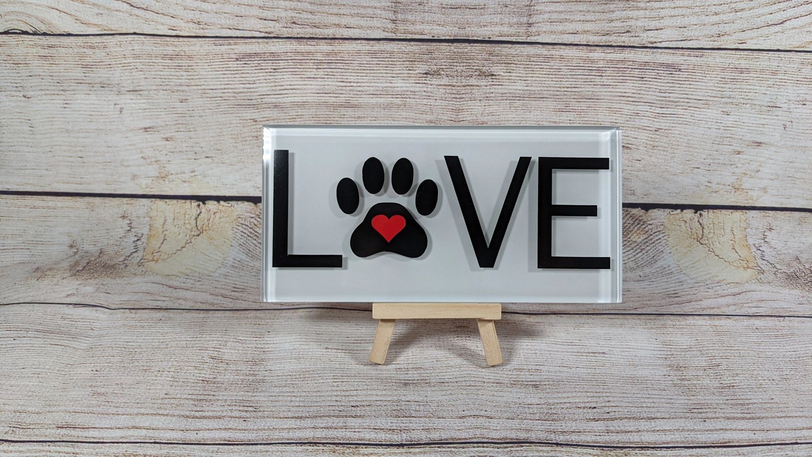 Dog themed glass tile with paw prints